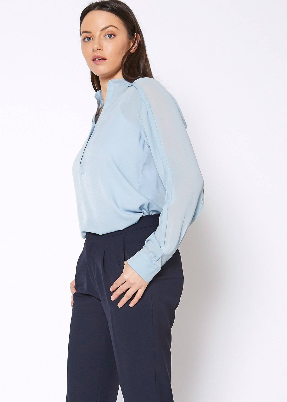 Women's mandarin collar shirt blouse in cashmere blue, featuring long sleeves and a sophisticated design.