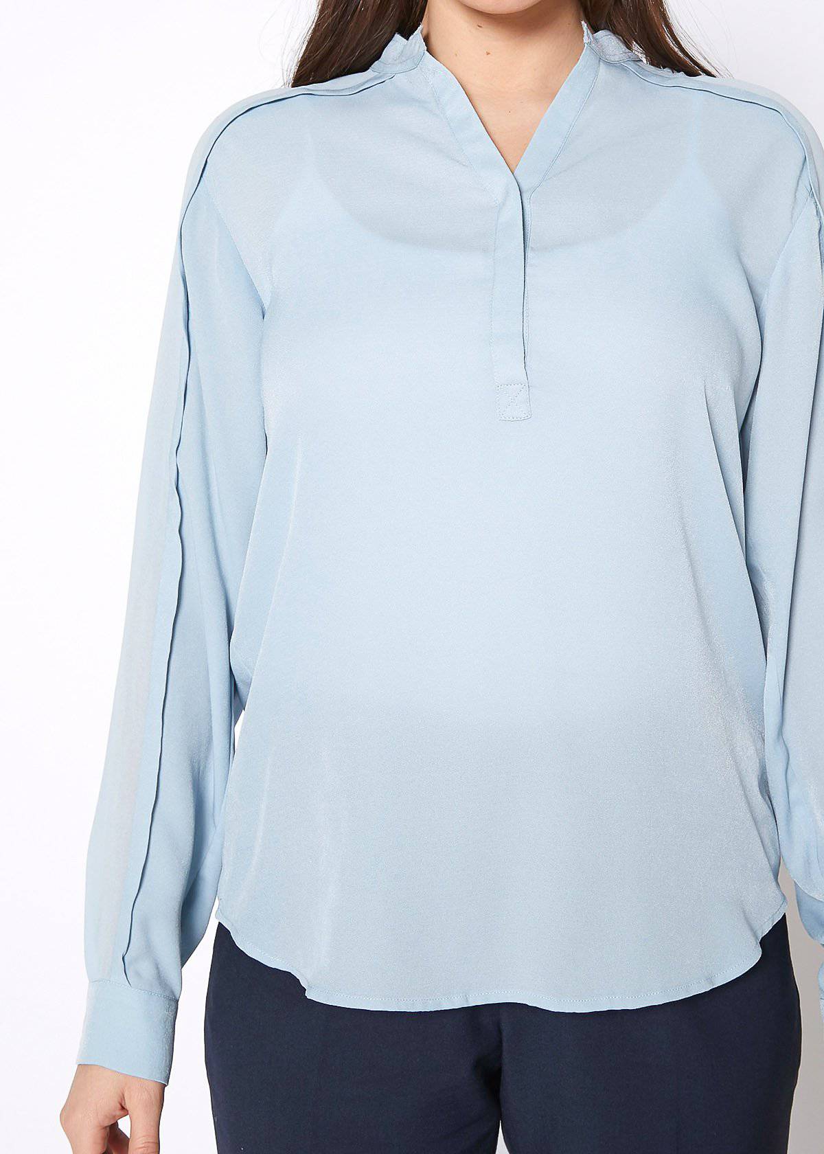 Women's mandarin collar shirt blouse in cashmere blue, featuring long sleeves and a sophisticated design.