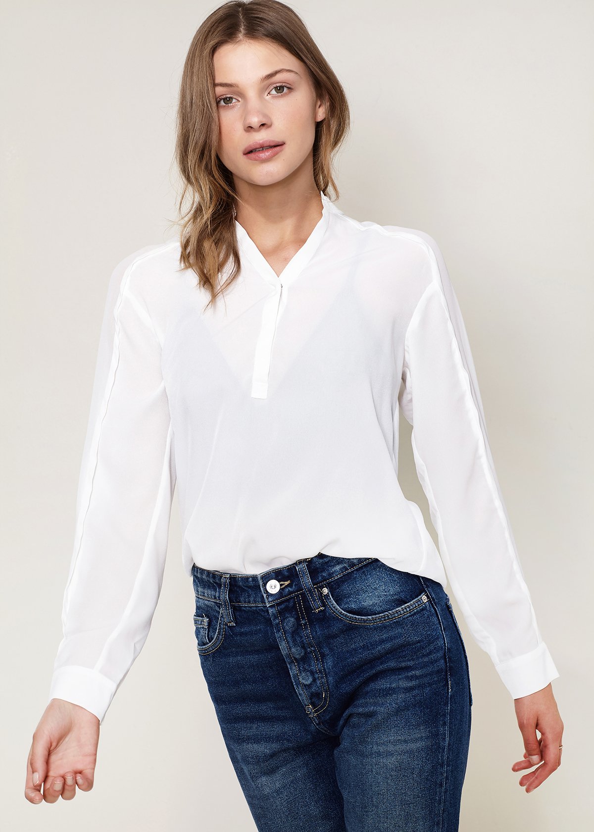 Women's ivory mandarin collar long sleeve shirt blouse, showcasing elegant design and soft fabric.