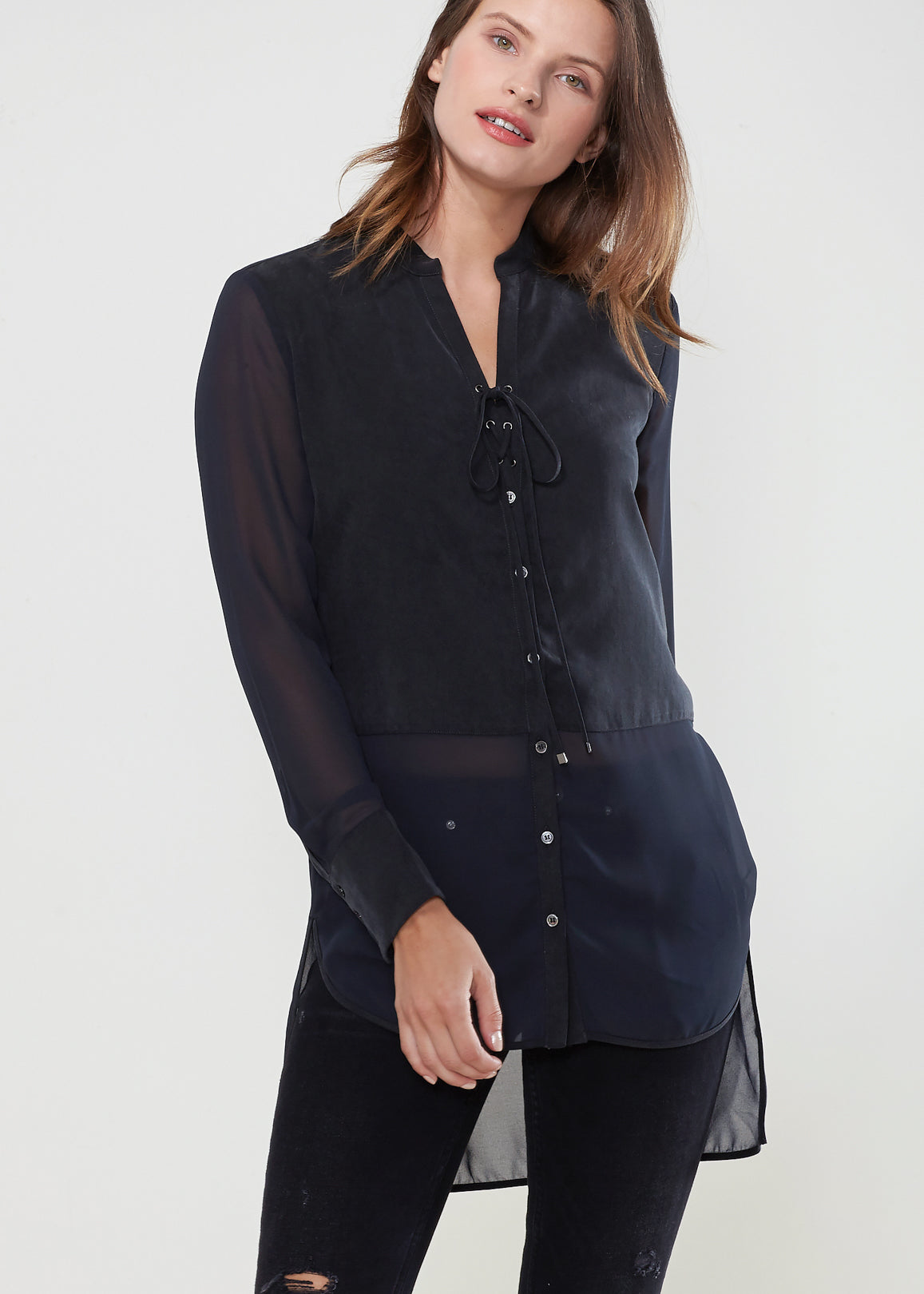 Women's black button-up shirt with sheer mesh sleeves and hem, showcasing a stylish and casual design.