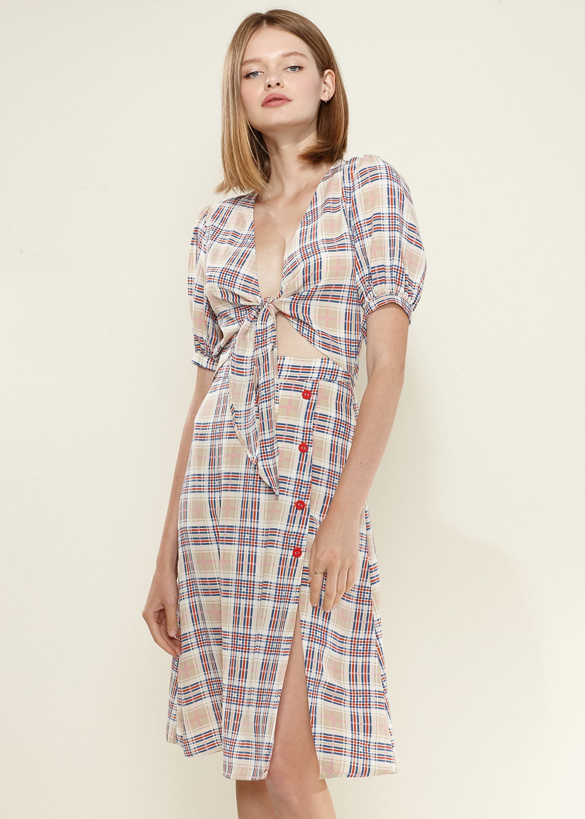 Women's Multi Check Front Tie Hem Blouse featuring puff short sleeves and a stylish front tie design.