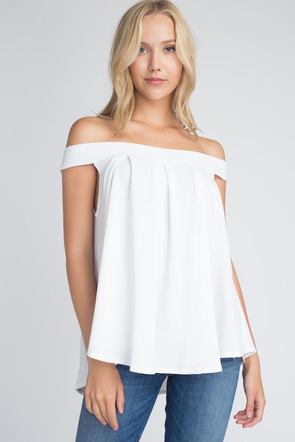 A stylish Women's Off Shoulder Flow Top in a flowy fit, showcasing its off-shoulder design and comfortable silhouette.