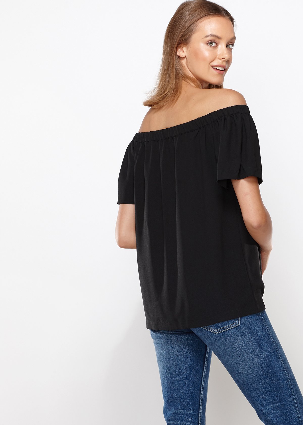 A stylish black women's off-shoulder top featuring short bell sleeves and an elasticized shoulder line, perfect for casual and formal occasions.