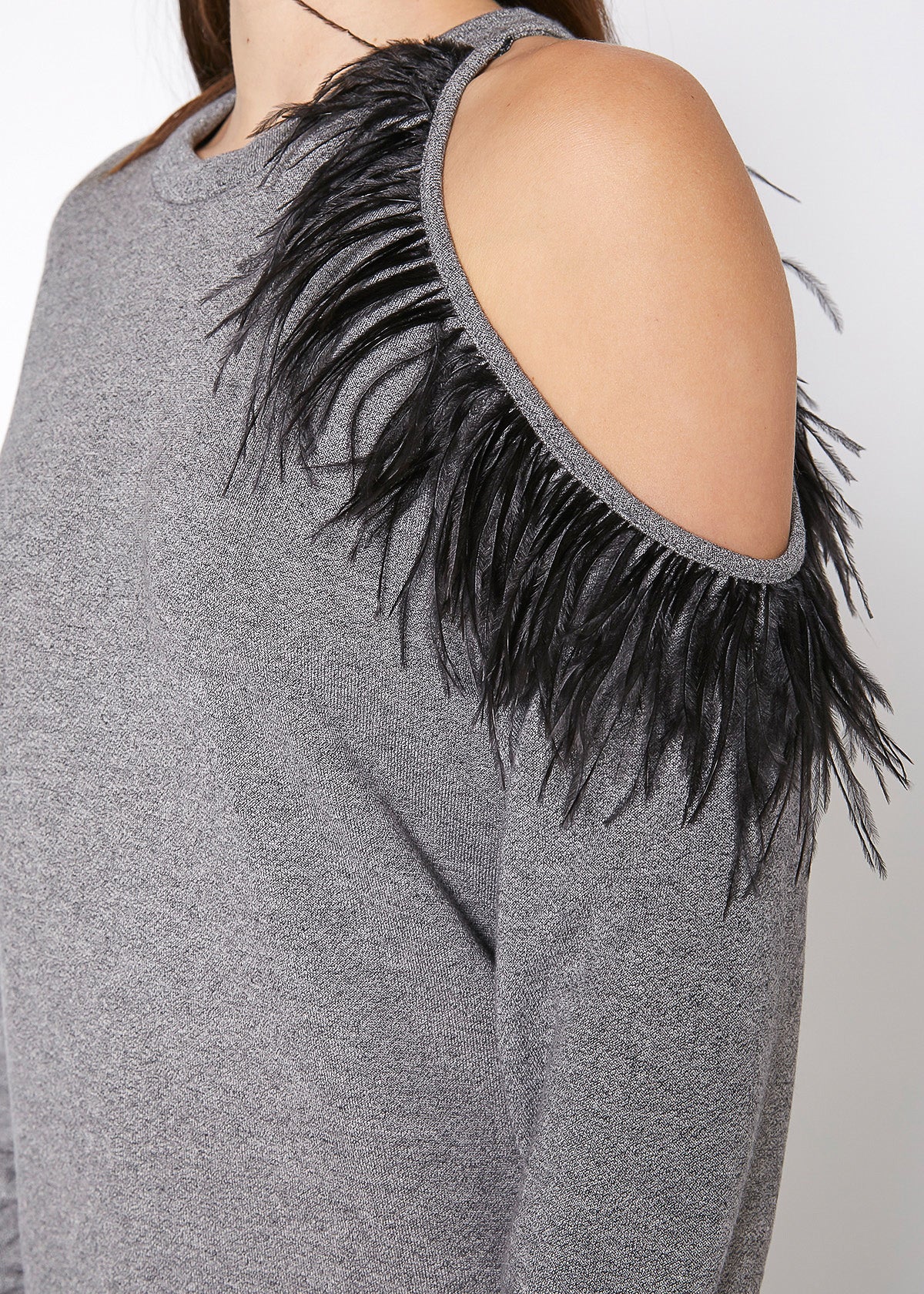 A stylish Women's One Shoulder Feather Sweatshirt featuring a trendy one-shoulder design, made from soft polyester and rayon blend fabric.