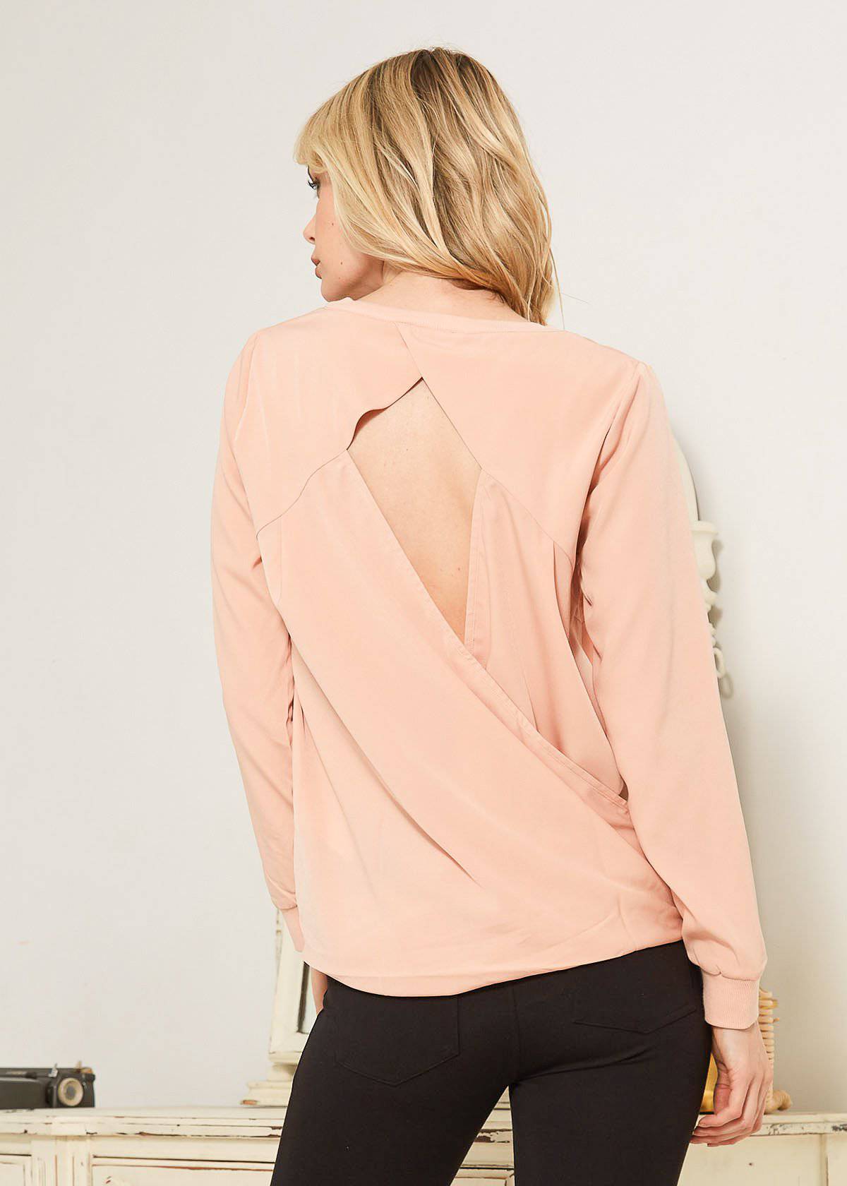 Women's Open Back Crewneck Top in Blush featuring a twisted back design and long sleeves with ribbed cuffs.