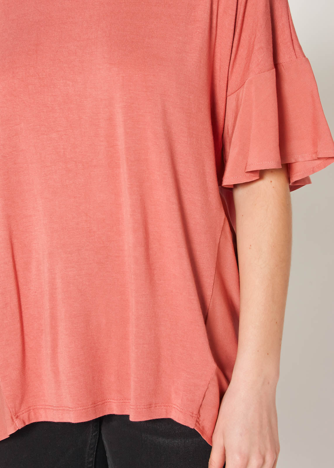 Women's oversized basic tunic top in terracotta, showcasing a relaxed fit and soft fabric.