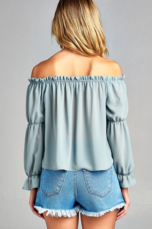 Woman in off-shoulder top.