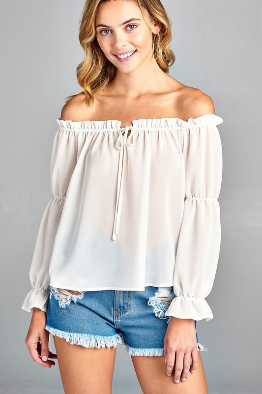 Woman in off-shoulder top.