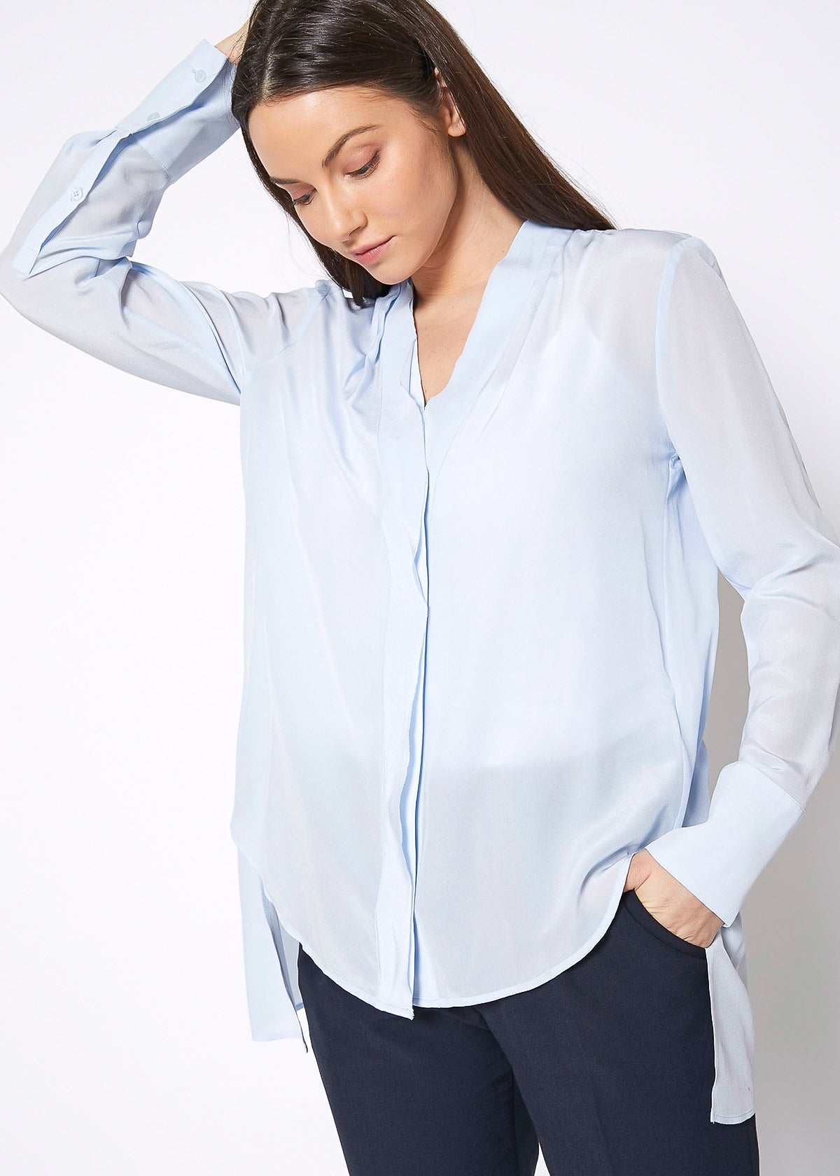 Women's Sheer Placket Hi Lo Blouse in flowy chiffon fabric with a high low hem, showcasing a stylish and elegant design.