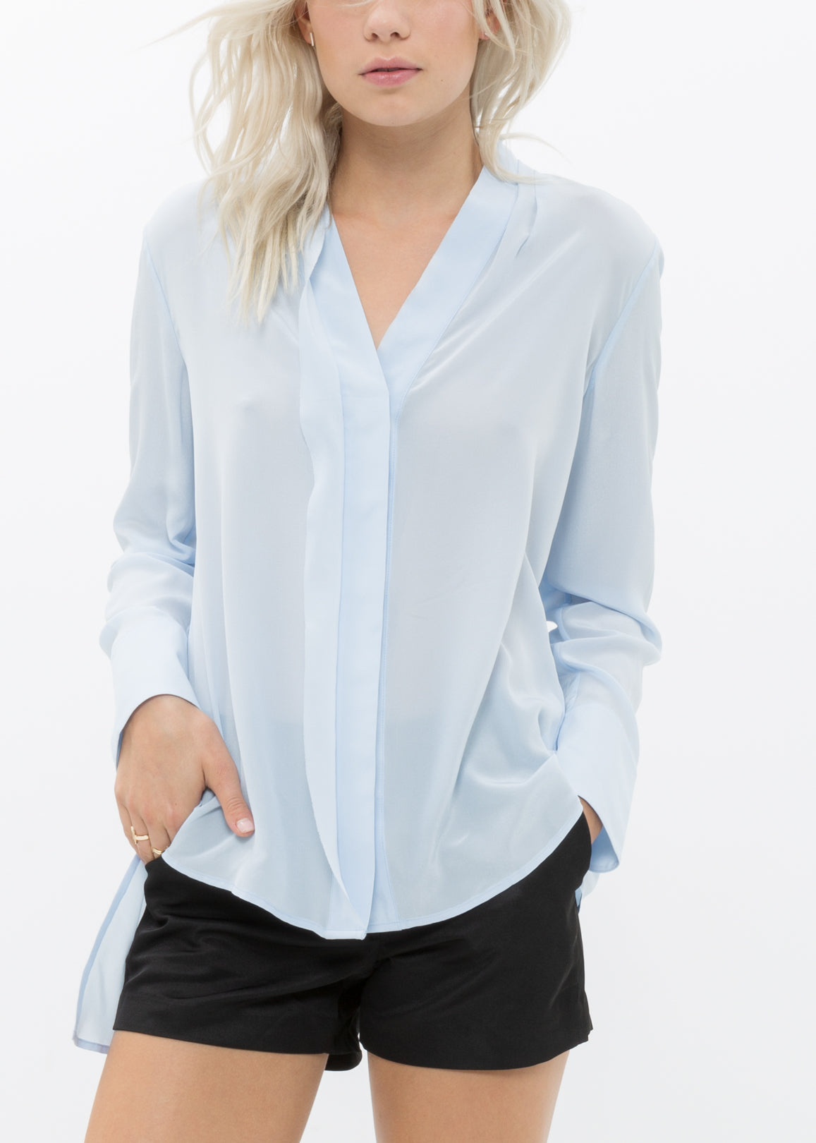 Women's Sheer Placket Hi Lo Blouse in flowy chiffon fabric with a high low hem, showcasing a stylish and elegant design.