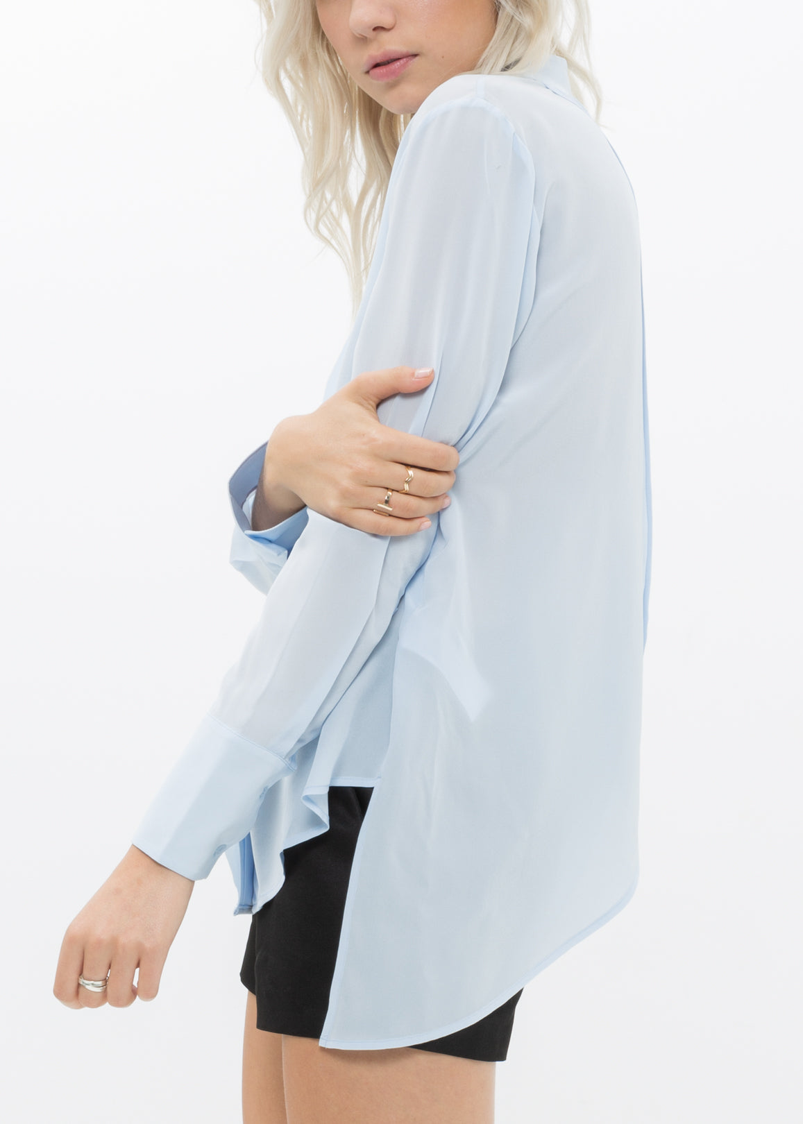 Women's Sheer Placket Hi Lo Blouse in flowy chiffon fabric with a high low hem, showcasing a stylish and elegant design.