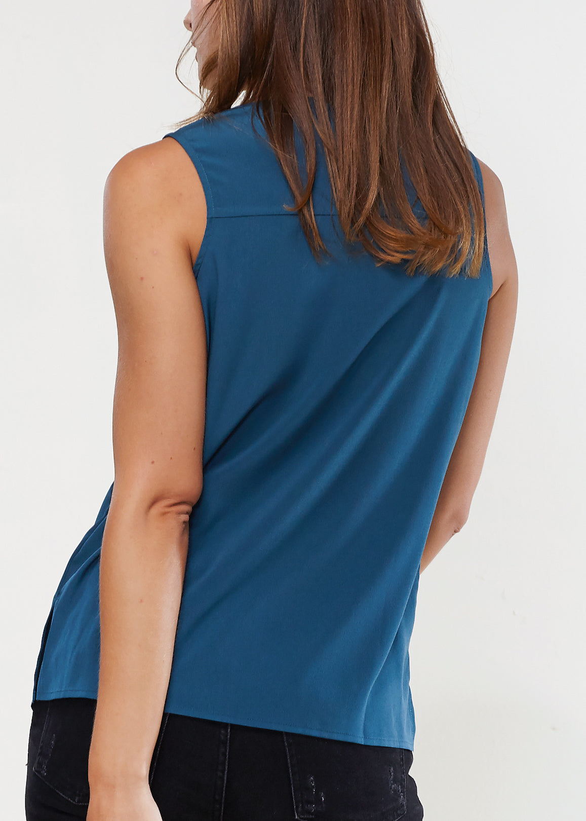 Women's sleeveless lace-up top made from 100% polyester, featuring a stylish lace-up front design.