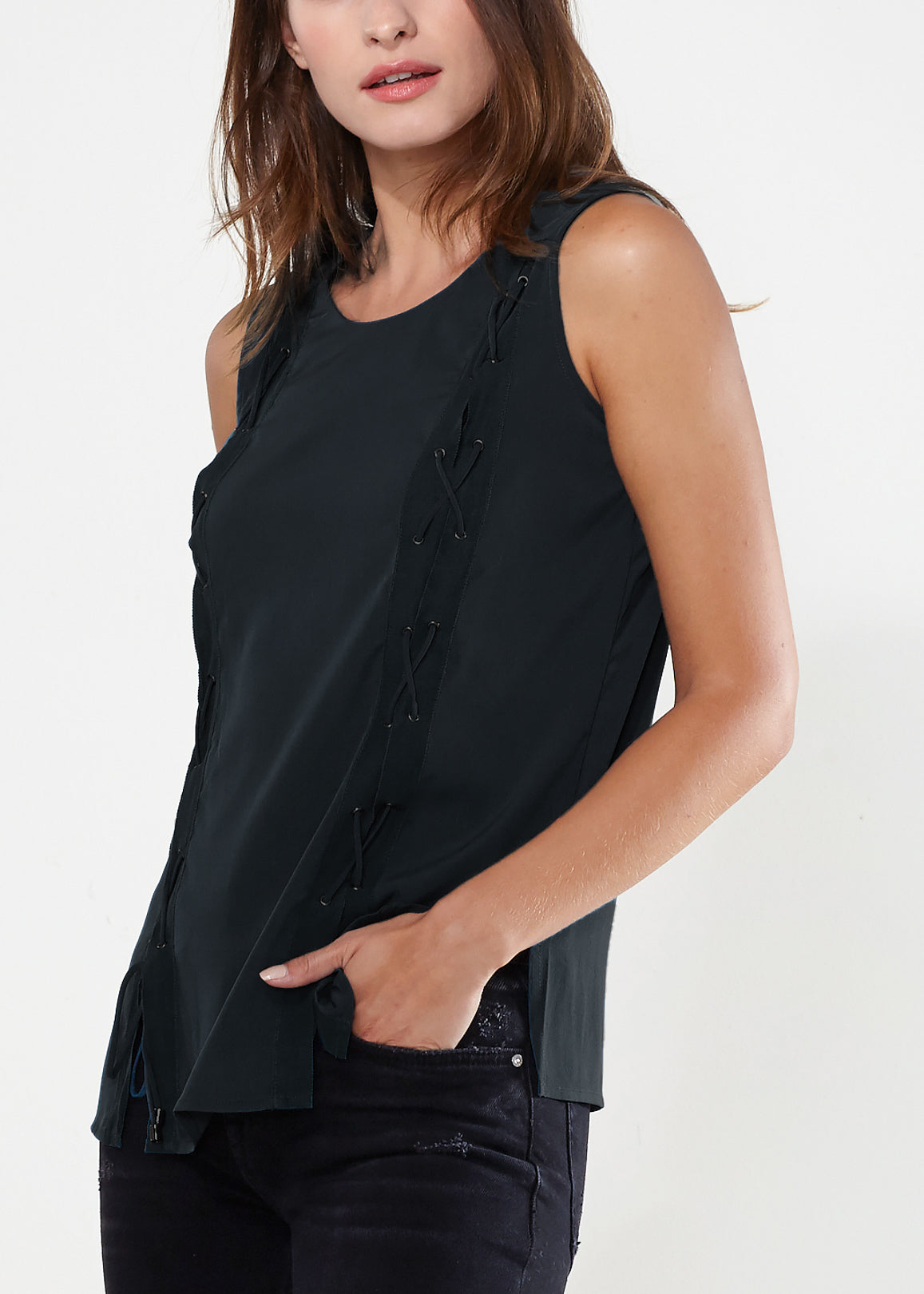 Women's sleeveless lace-up top made from 100% polyester, featuring a stylish lace-up front design.