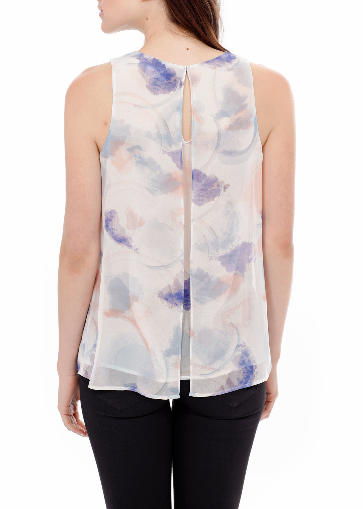 A stylish women's sleeveless blouse featuring a vibrant water color pattern and elegant slit detail, perfect for layering or solo wear.