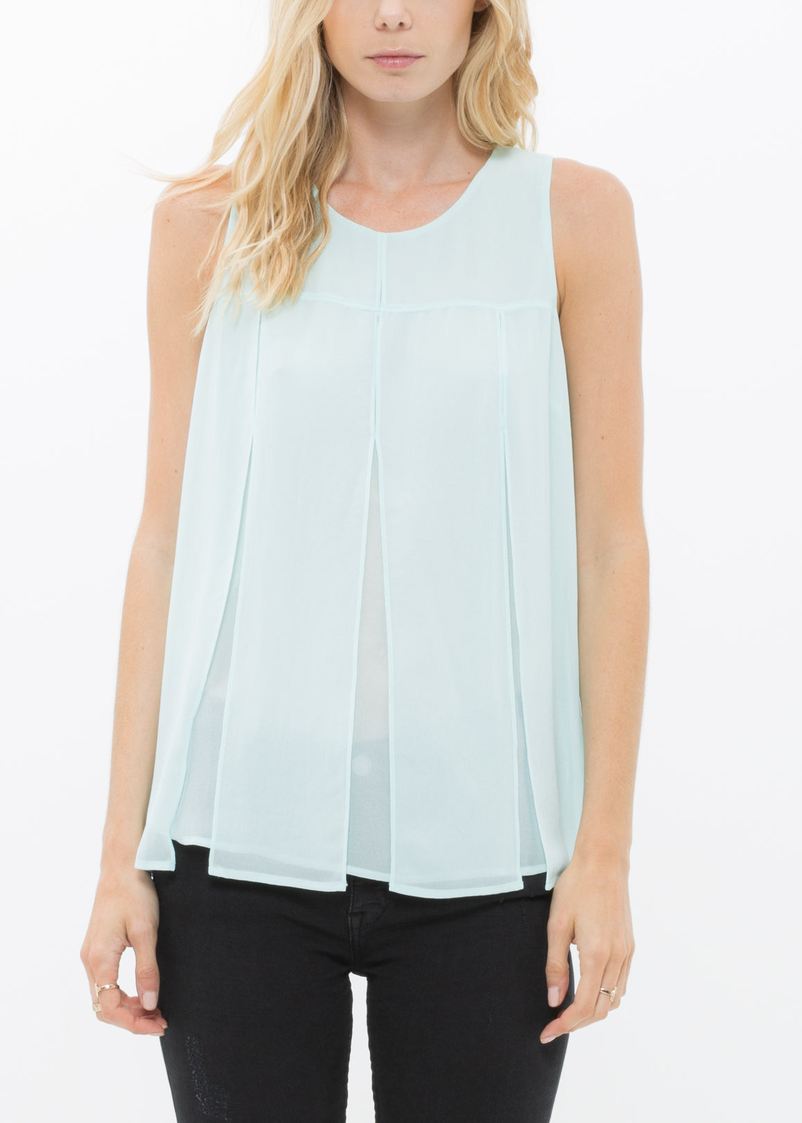 A stylish Women's Sleeveless Slit Blouse featuring a chic design with a slit and button back closure, made from 100% polyester.