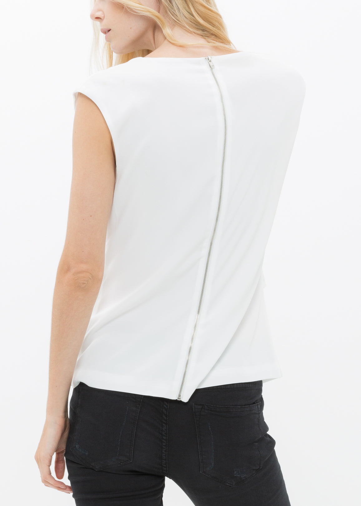 Women's sleeveless wrap blouse in ivory with back zip design, showcasing a chic and casual style.