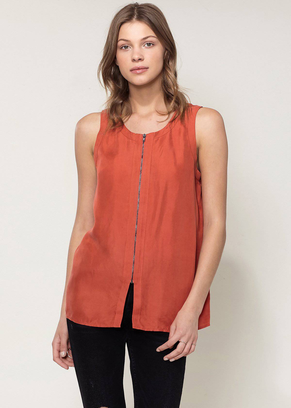 A stylish women's sleeveless top featuring a zip-up front, made from a soft cupro and viscose blend, perfect for casual wear.