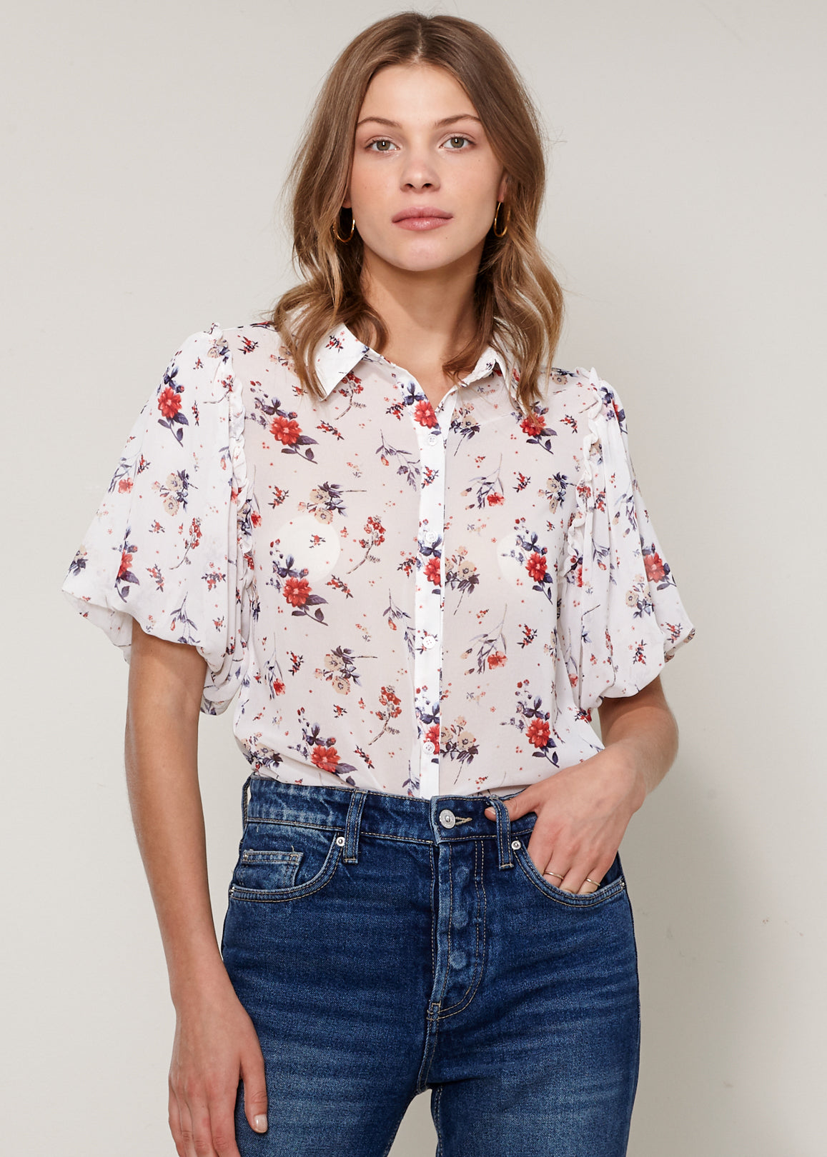 Women's Soft Flower Bell Sleeve Shirt Blouse featuring elegant bell sleeves and floral pattern, made from soft polyester fabric.