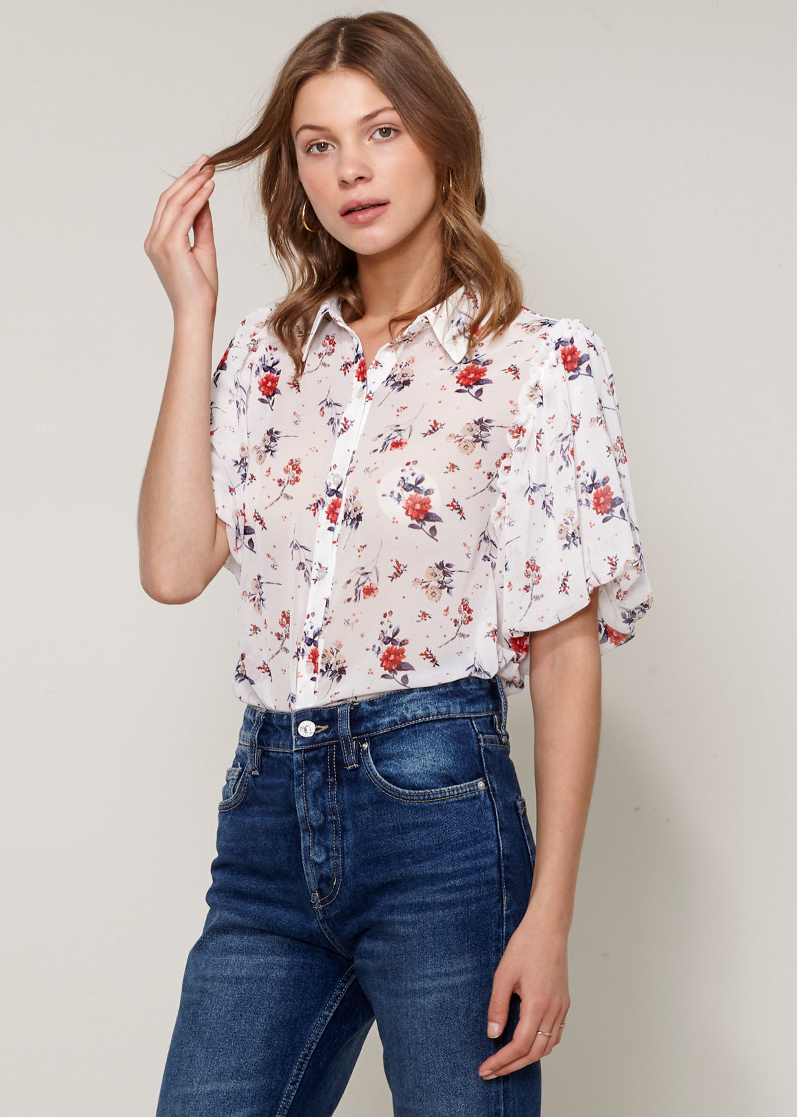 Women's Soft Flower Bell Sleeve Shirt Blouse featuring elegant bell sleeves and floral pattern, made from soft polyester fabric.