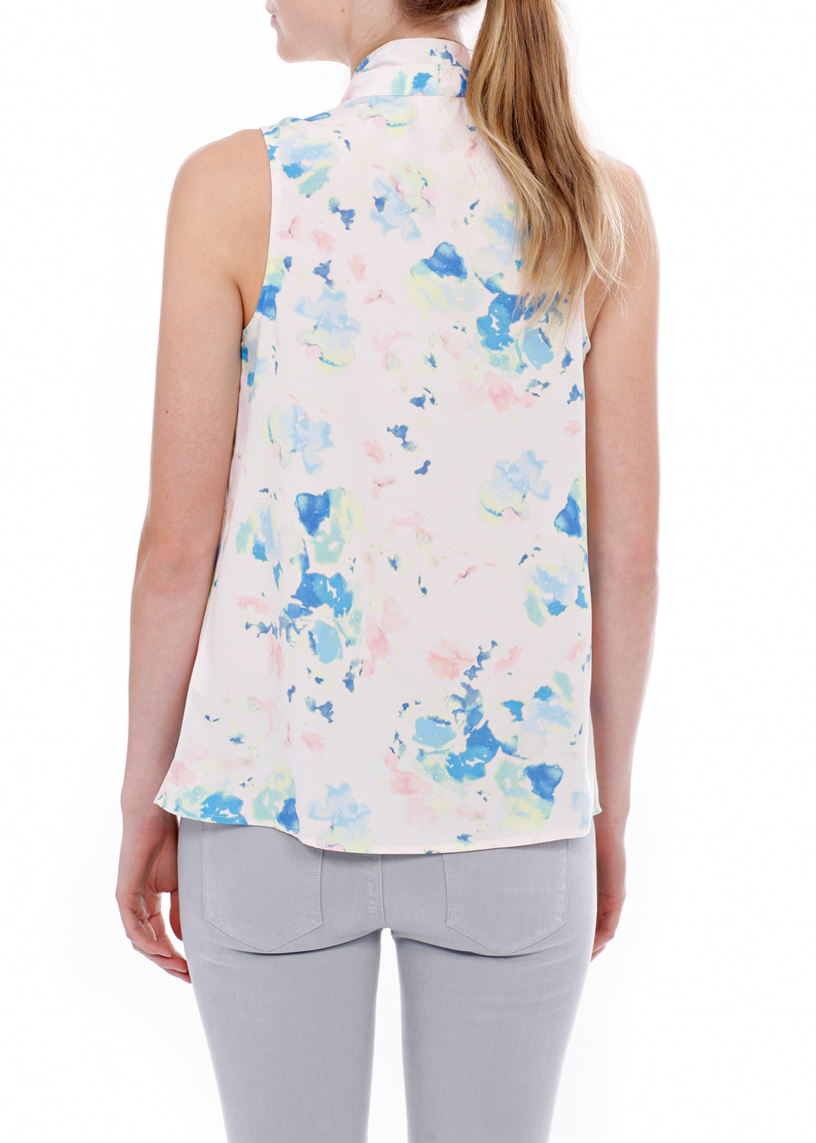 A stylish Women's Sophisticated V Neck Blouse Top in floral design, made from 100% polyester, showcasing elegance and comfort.