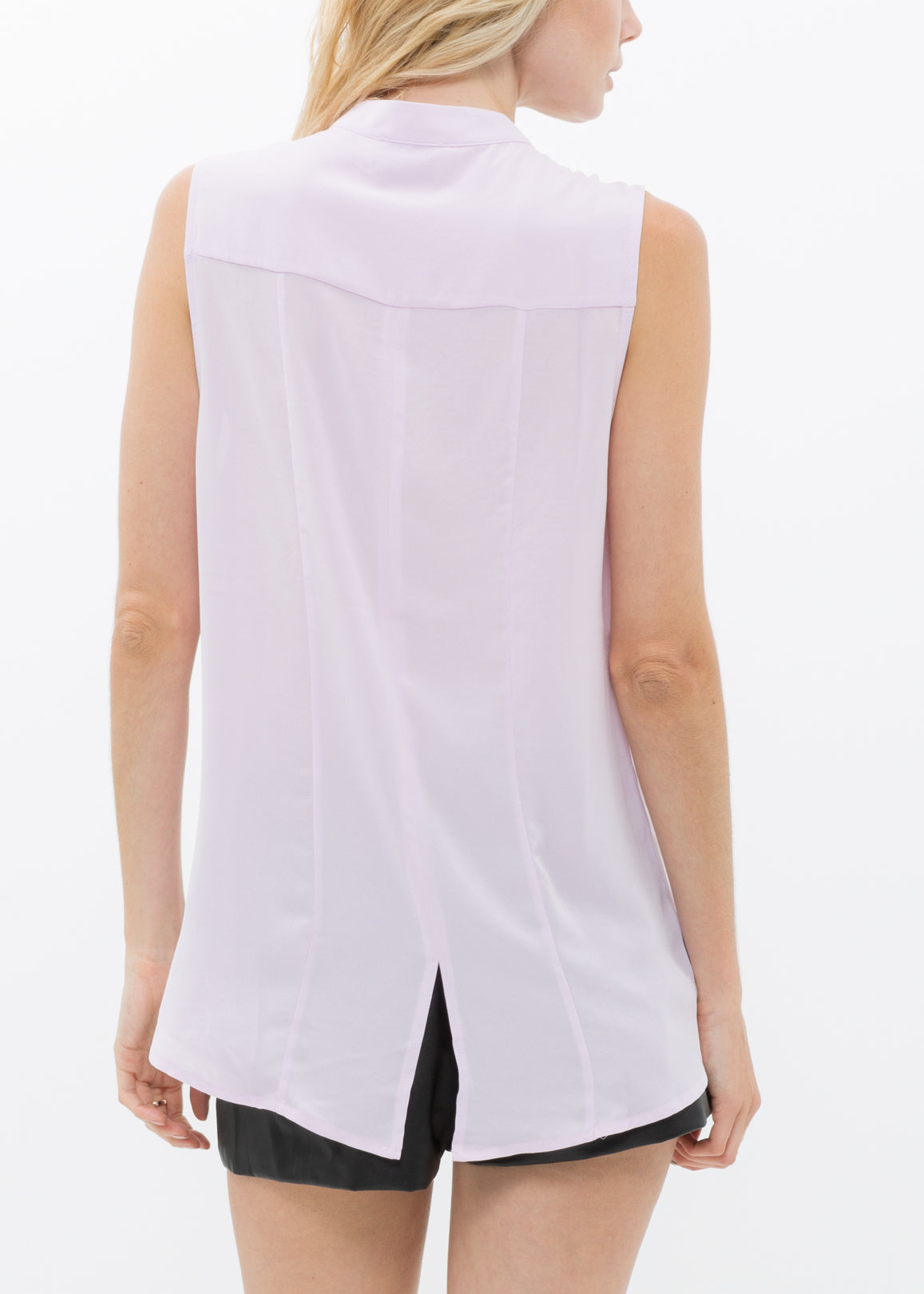 Women's stand collar sleeveless blouse with hidden-button fly closure and hi-lo slit hem, made from 100% polyester.