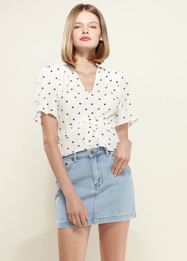 Women's Triangle Print Puff Sleeve Blouse in White with stylish triangle pattern and peplum design.