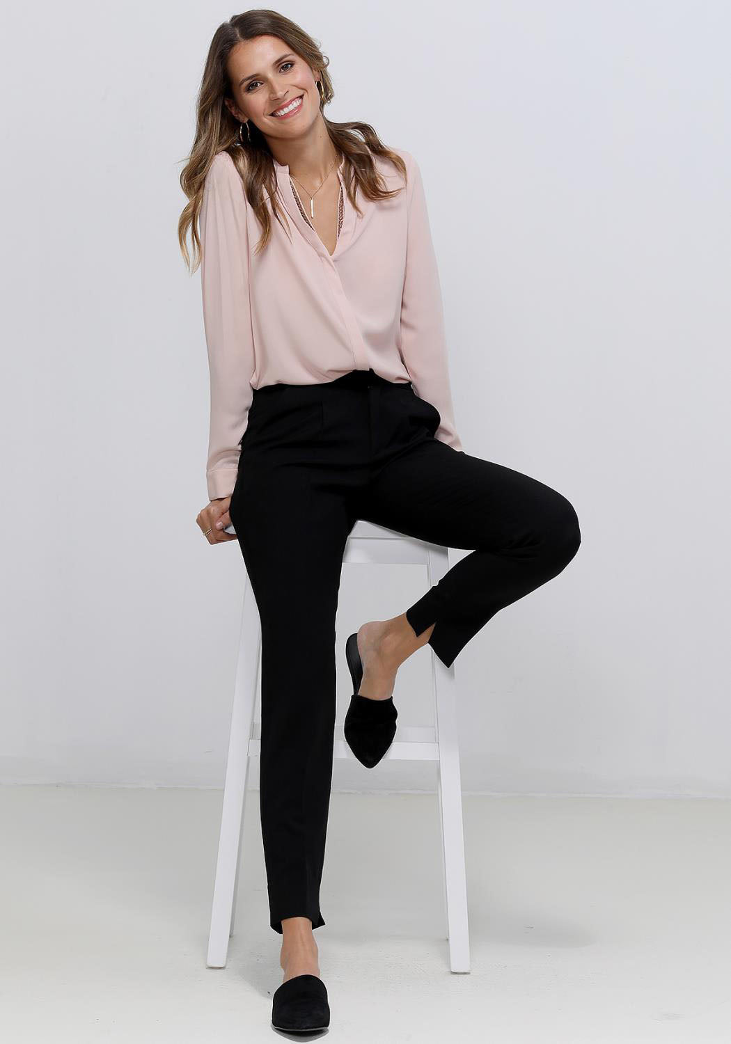 Women's V-Neck Essential Blouse with long sleeves, embellished neck, and round hem in a stylish design.