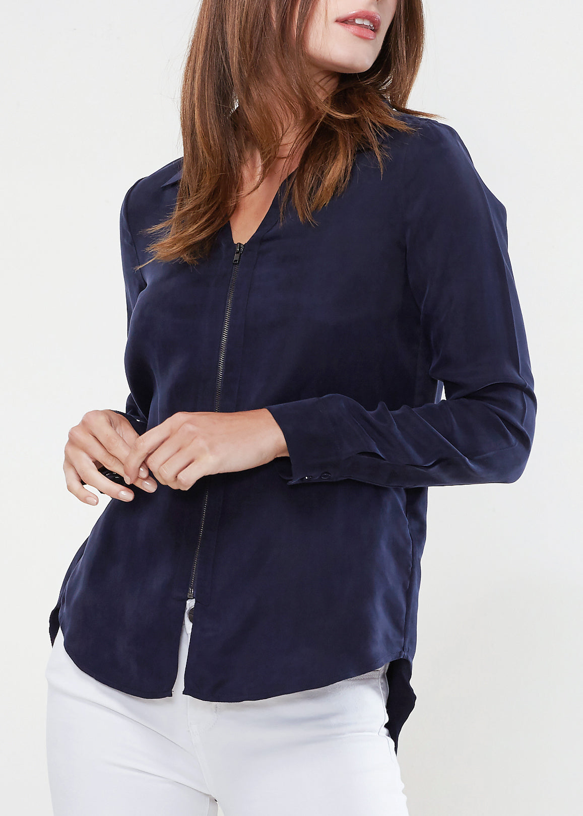 Women's zip-up shirt blouse with standard collar, hi-lo hem, and long sleeves with button cuffs, made from soft Cupro and Viscose blend.