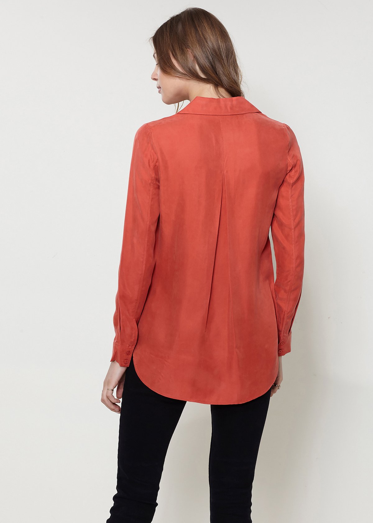 Women's zip-up shirt blouse with standard collar, hi-lo hem, and long sleeves with button cuffs, made from soft Cupro and Viscose blend.