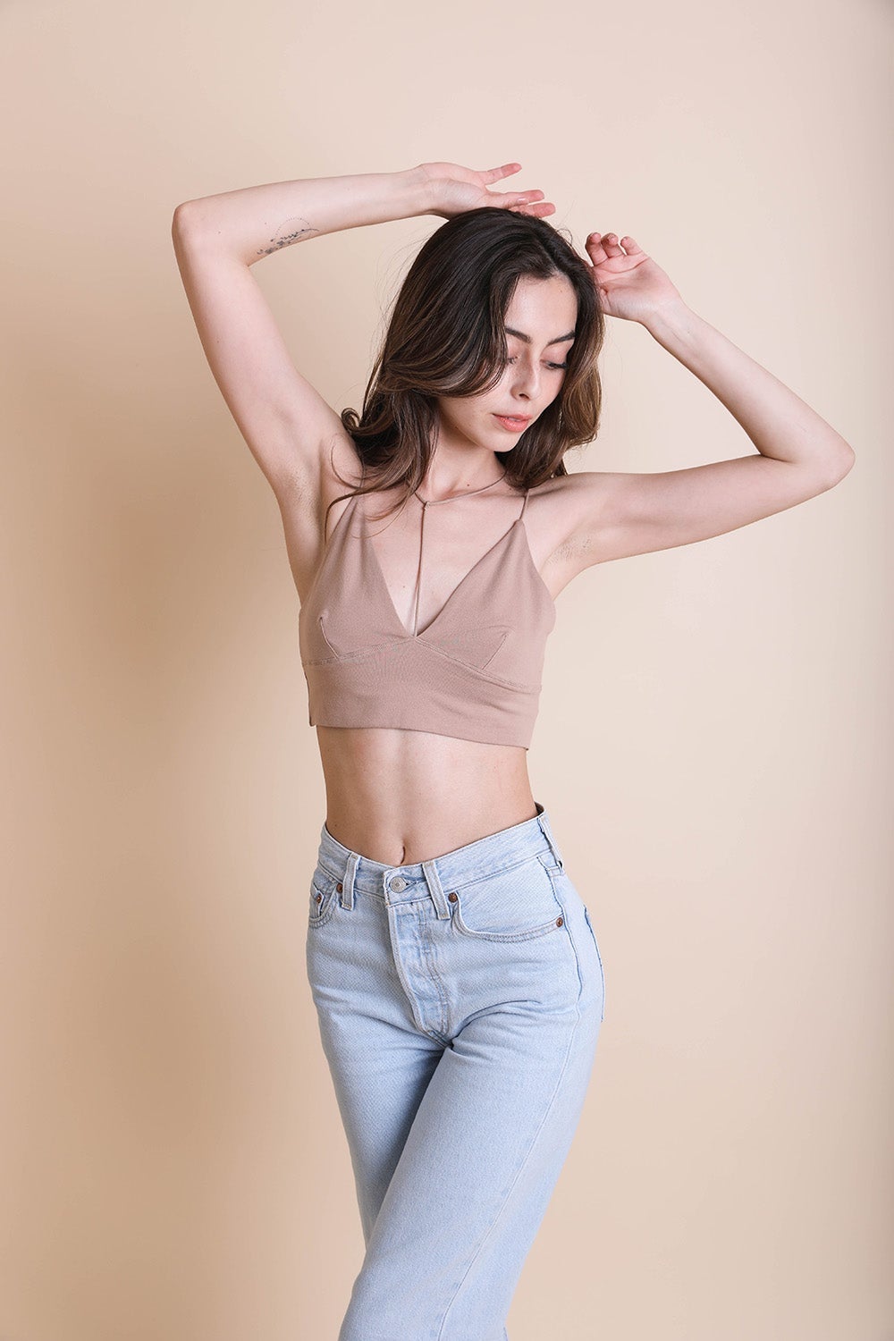 Y-Neck Plunge Crop Top featuring a stylish Y neckline and soft, stretchy fabric, perfect for casual or gym wear.