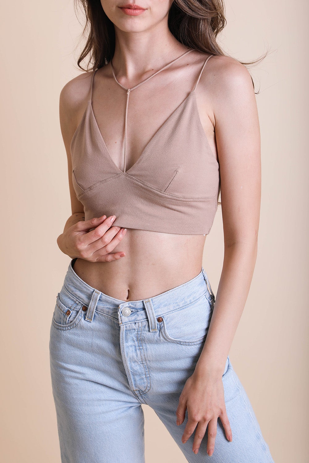 Y-Neck Plunge Crop Top featuring a stylish Y neckline and soft, stretchy fabric, perfect for casual or gym wear.