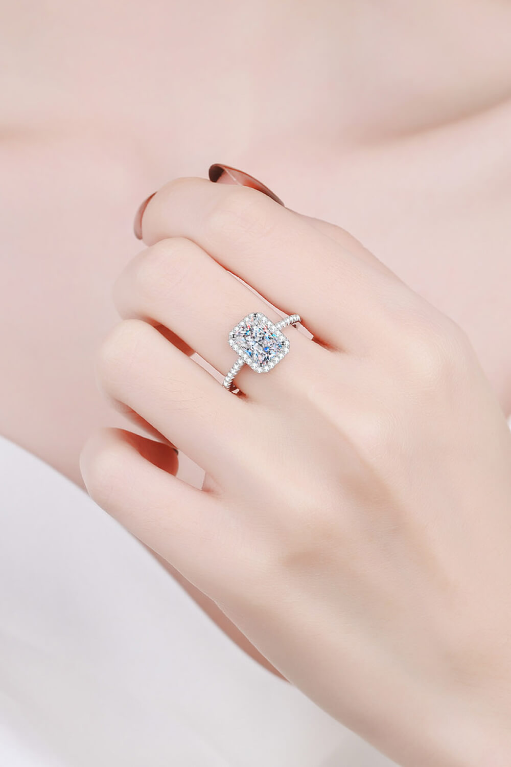 1 Carat Rectangle Moissanite Ring in 925 sterling silver, showcasing its elegant design and brilliant stone.