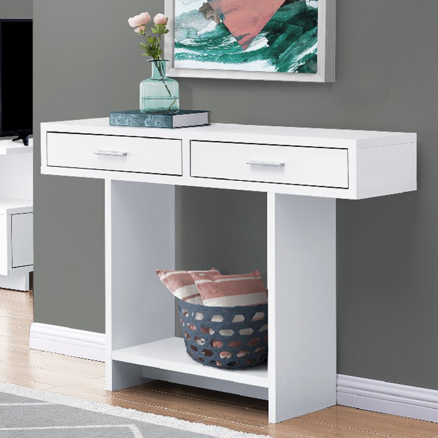 Elegant white particle board accent table with hollow core design, perfect for displaying decor items in a living room setting.