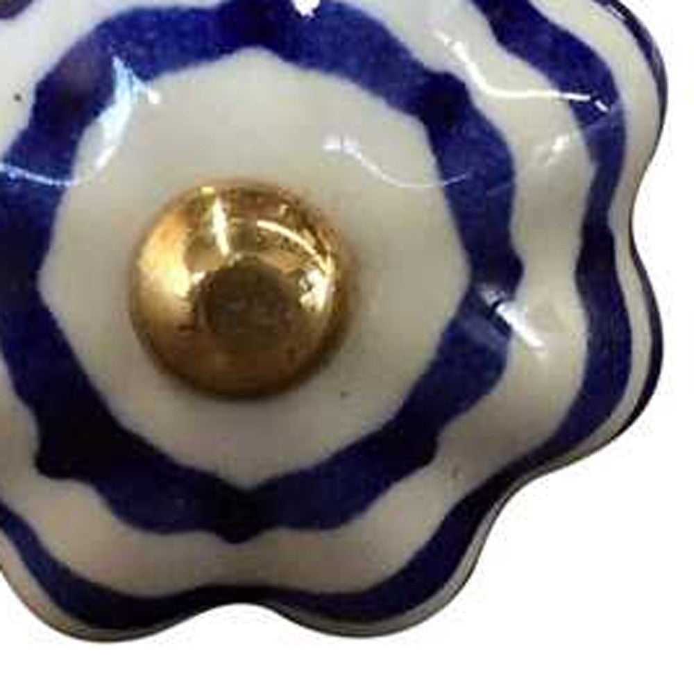 A pack of 12 hand-painted ceramic knobs in white, blue, and copper colors, designed for furniture enhancement.