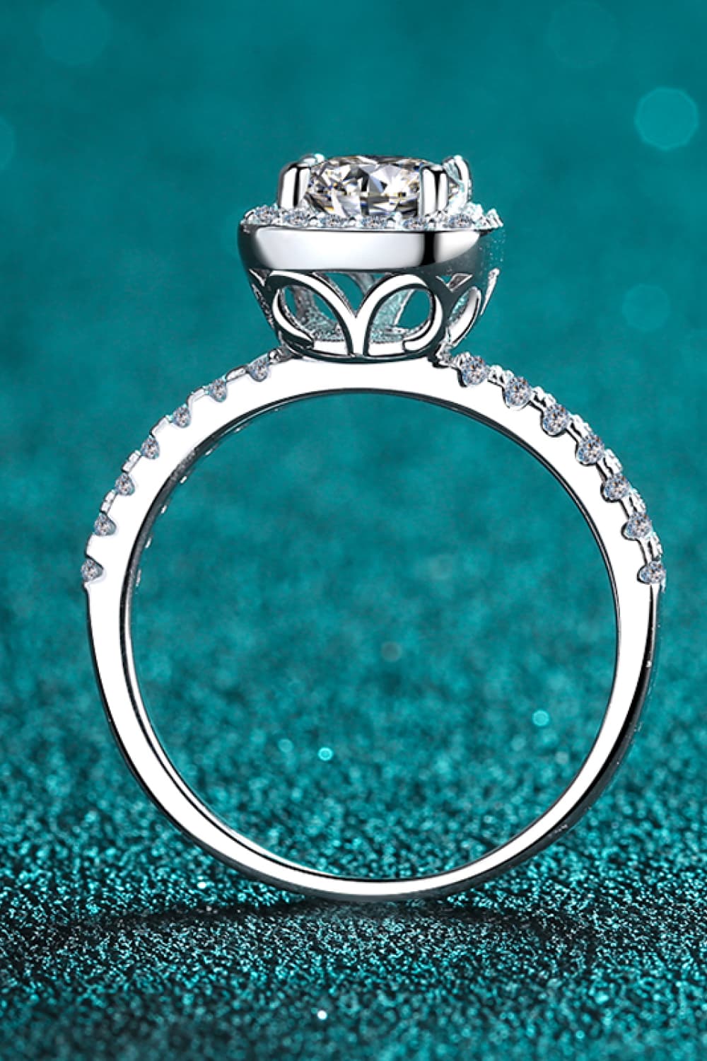 A beautiful 2 Carat Moissanite Square Halo Ring crafted in 925 sterling silver with a polished finish, featuring a central moissanite stone surrounded by zircon accents.