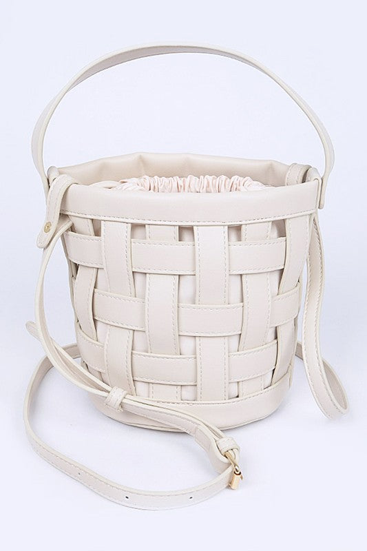 A stylish 2 In 1 Open Weaved Bucket Swing Bag showcasing its unique open-weaved design and compact size.