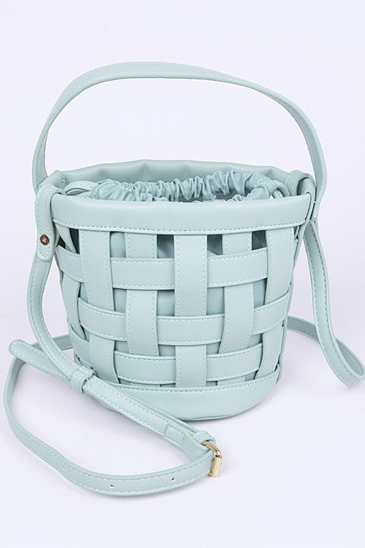 A stylish 2 In 1 Open Weaved Bucket Swing Bag showcasing its unique open-weaved design and compact size.