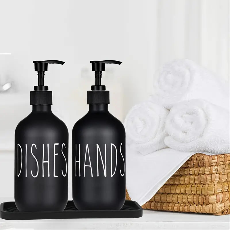 Two matte black soap dispensers with pumps, ideal for hand and dish soap, showcasing a sleek and modern design.