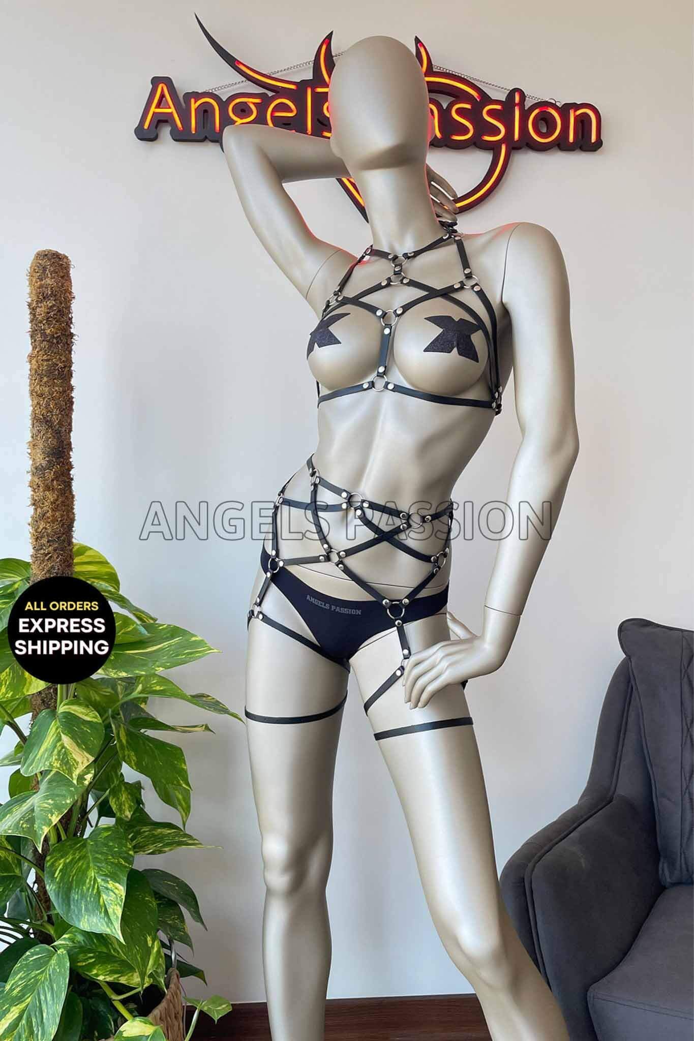 A seductive 2 Piece Leather Strap Lingerie set featuring intricate leather straps that enhance the silhouette, perfect for intimate occasions.