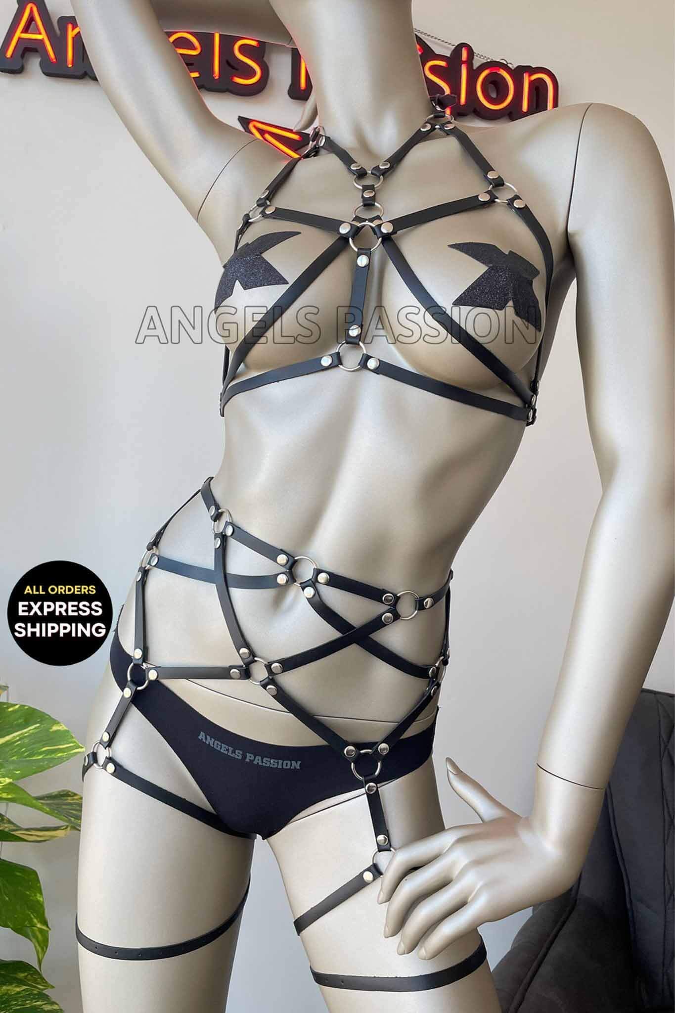 A seductive 2 Piece Leather Strap Lingerie set featuring intricate leather straps that enhance the silhouette, perfect for intimate occasions.