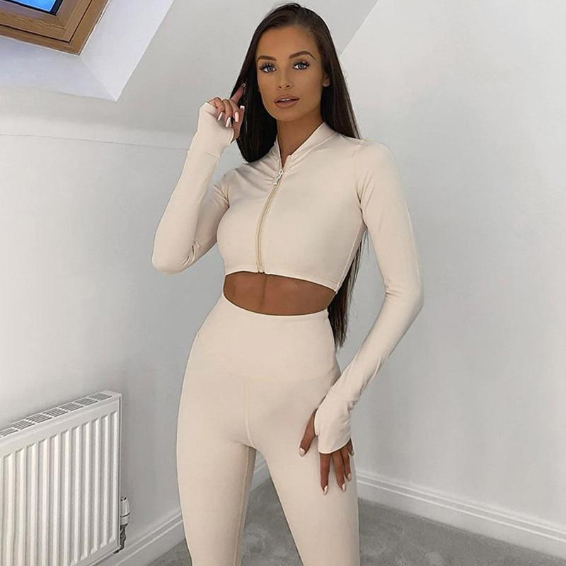 A stylish 2 Piece Set featuring a long sleeve crop top and high waist leggings in three trendy colors, perfect for winter streetwear.