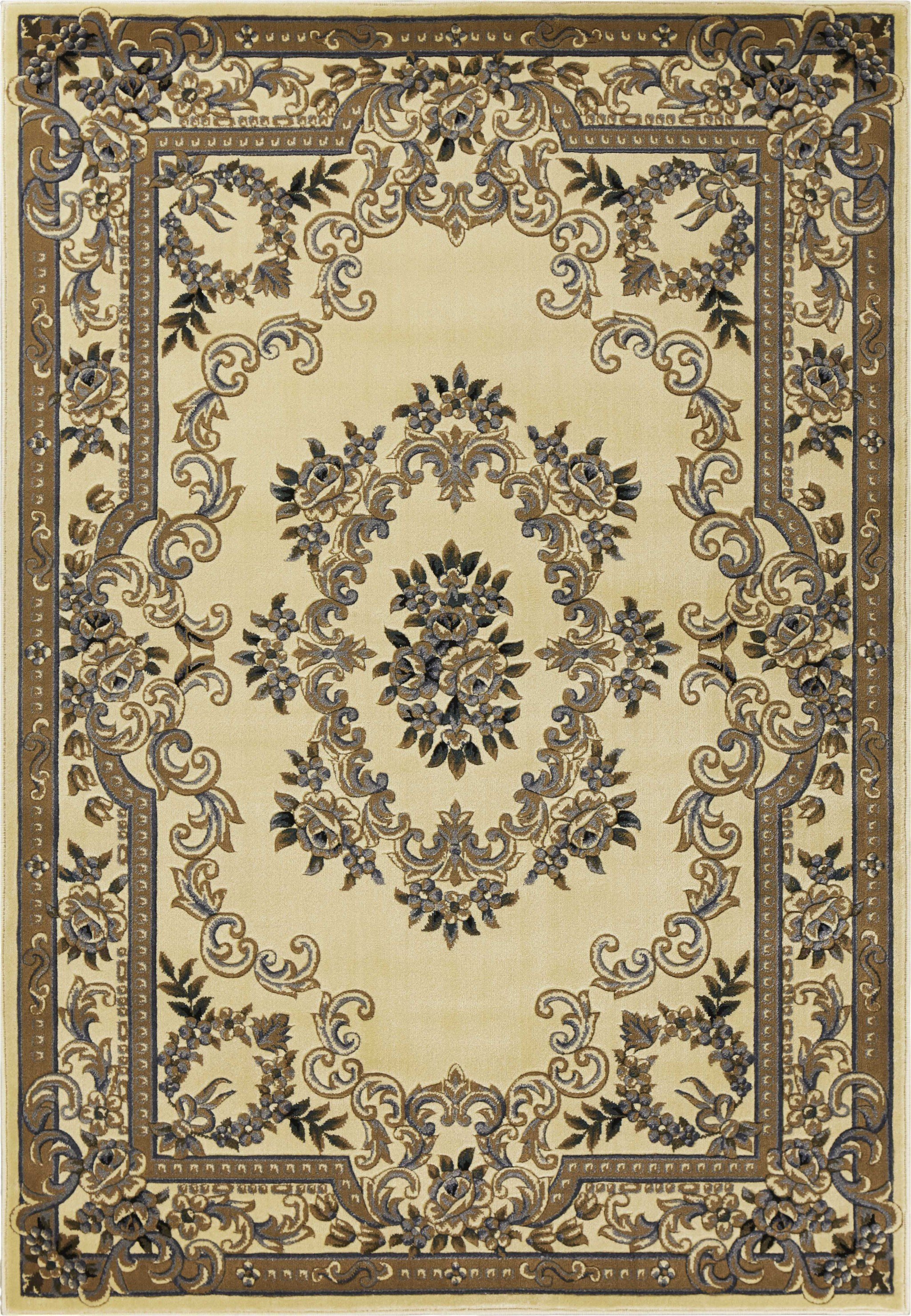 A beautiful 2' x 3' ivory area rug with intricate hand-carved details, perfect for enhancing home decor.