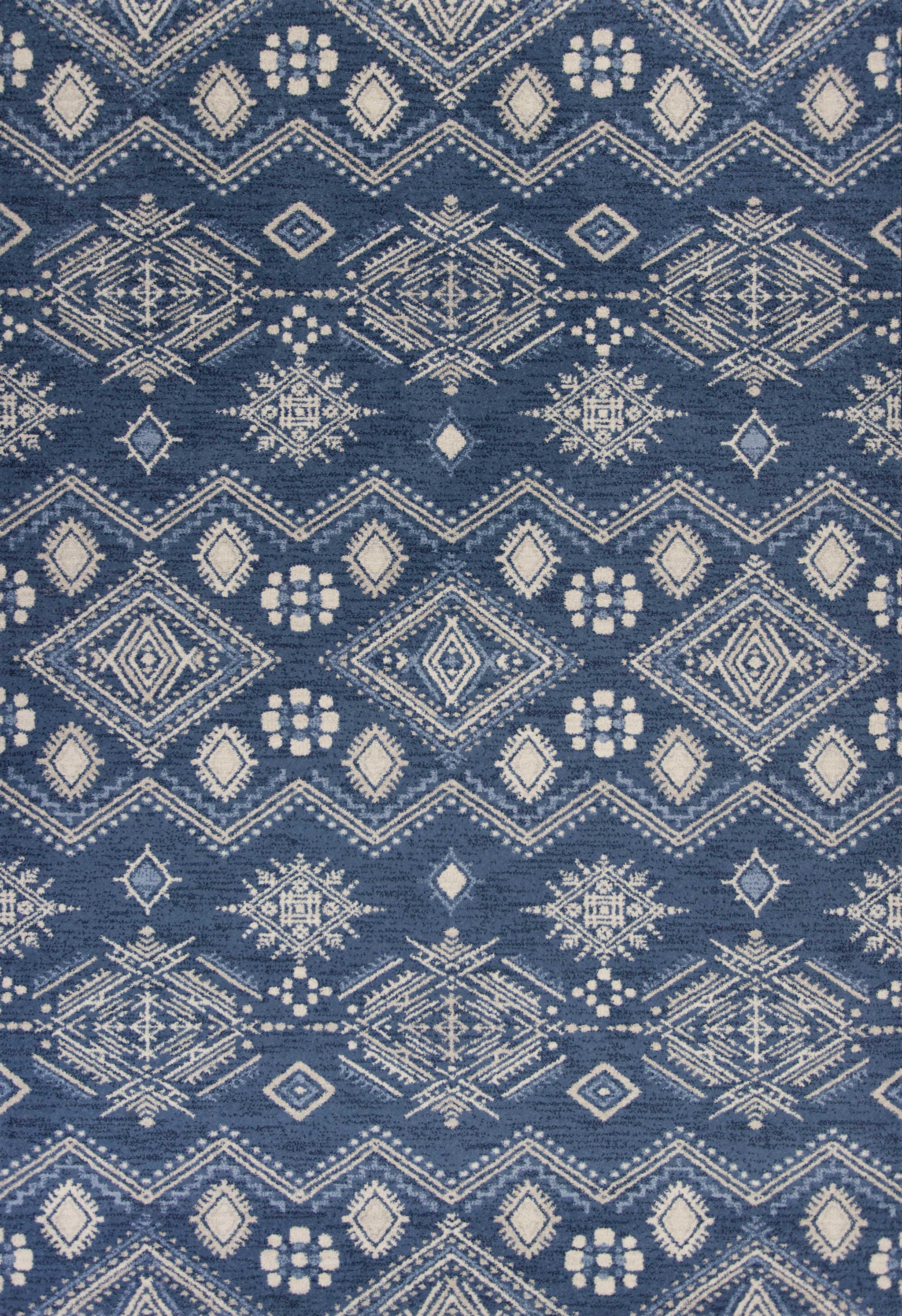 A stylish 2' x 4' Polypropylene Denim Area Rug featuring a bohemian design, perfect for enhancing home decor.