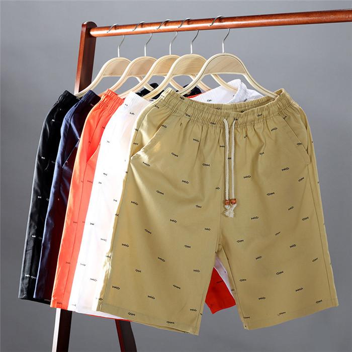 2020 Men's Casual Shorts in knee-length design, made from breathable cotton with a drawstring closure, perfect for summer activities.