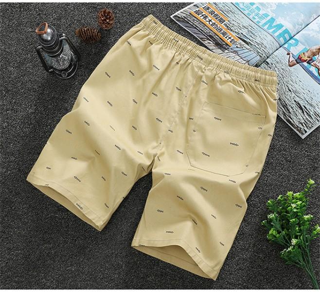 2020 Men's Casual Shorts in knee-length design, made from breathable cotton with a drawstring closure, perfect for summer activities.