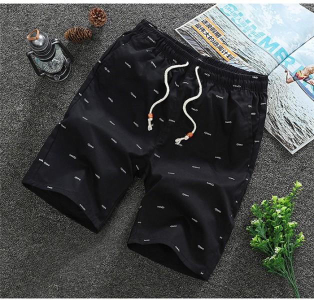 2020 Men's Casual Shorts in knee-length design, made from breathable cotton with a drawstring closure, perfect for summer activities.