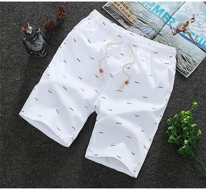 2020 Men's Casual Shorts in knee-length design, made from breathable cotton with a drawstring closure, perfect for summer activities.