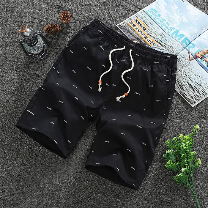 2020 Men's Casual Shorts in knee-length design, made from breathable cotton with a drawstring closure, perfect for summer activities.