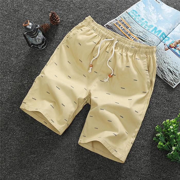 2020 Men's Casual Shorts in knee-length design, made from breathable cotton with a drawstring closure, perfect for summer activities.