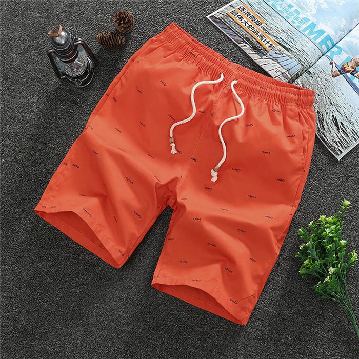 2020 Men's Casual Shorts in knee-length design, made from breathable cotton with a drawstring closure, perfect for summer activities.